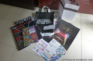 Tote bag of magazines and pamphlet.